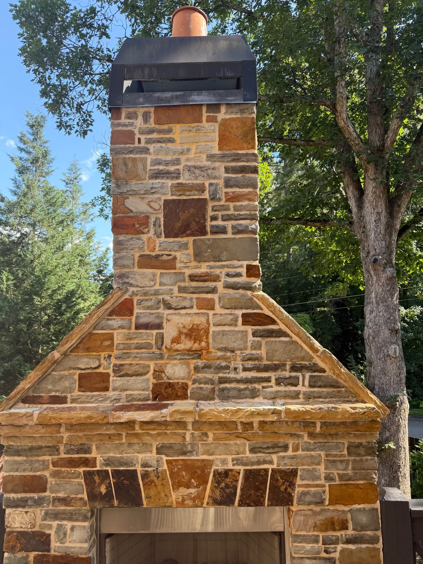 Stone chimney cleaned by KM Property Restorations