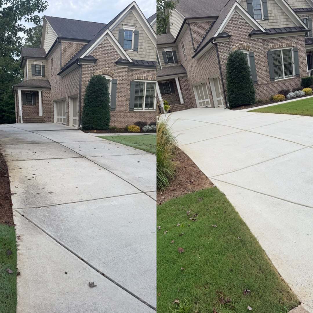 Before and after pressure washing a concrete driveway at a brick home by KM Property Restorations in Marietta