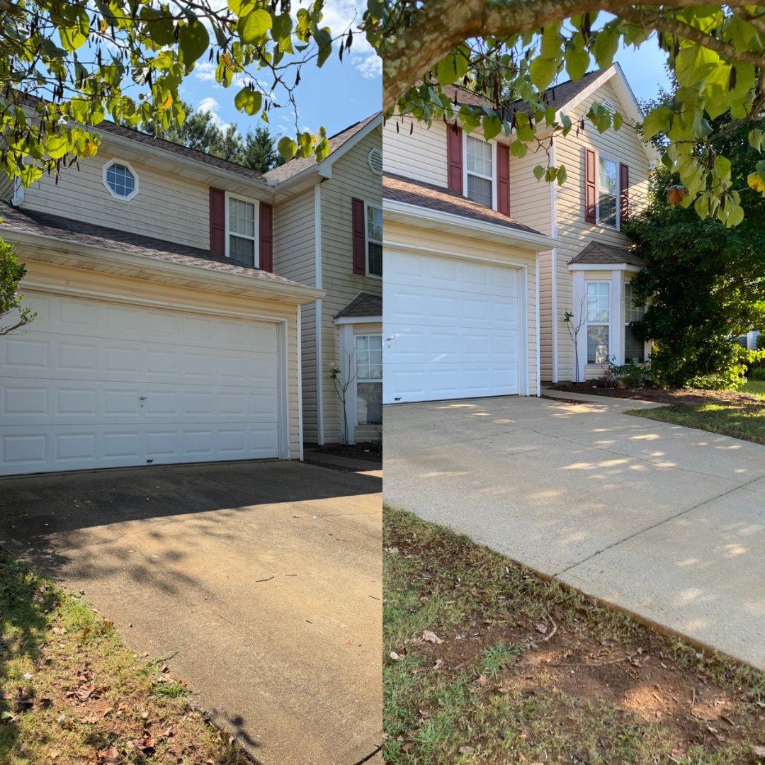 Before and after pressure washing a driveway and garage apron by KM Property Restorations in Marietta