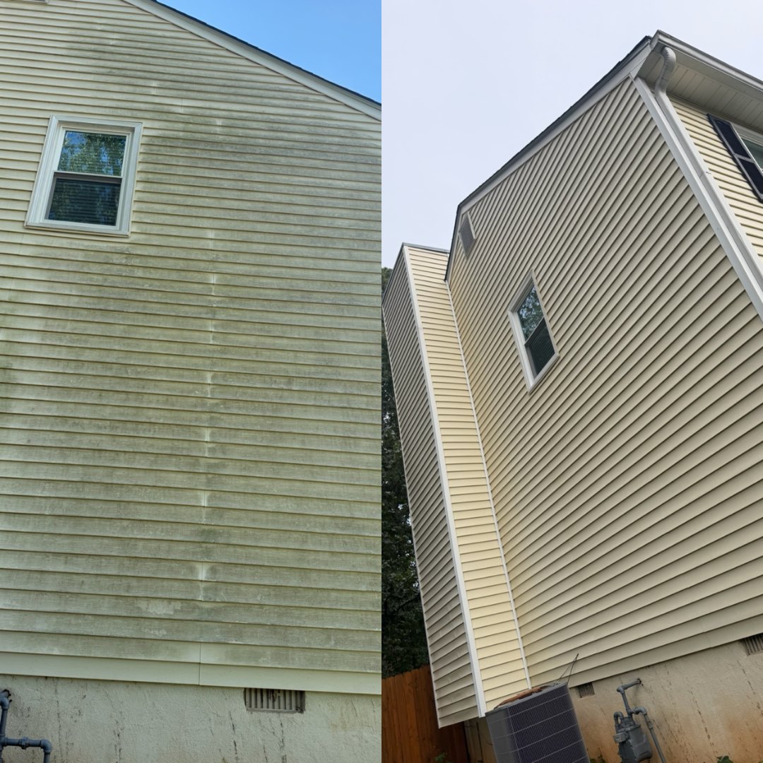Before and after house washing a tall gable end covered in green algae by KM Property Restorations in Marietta