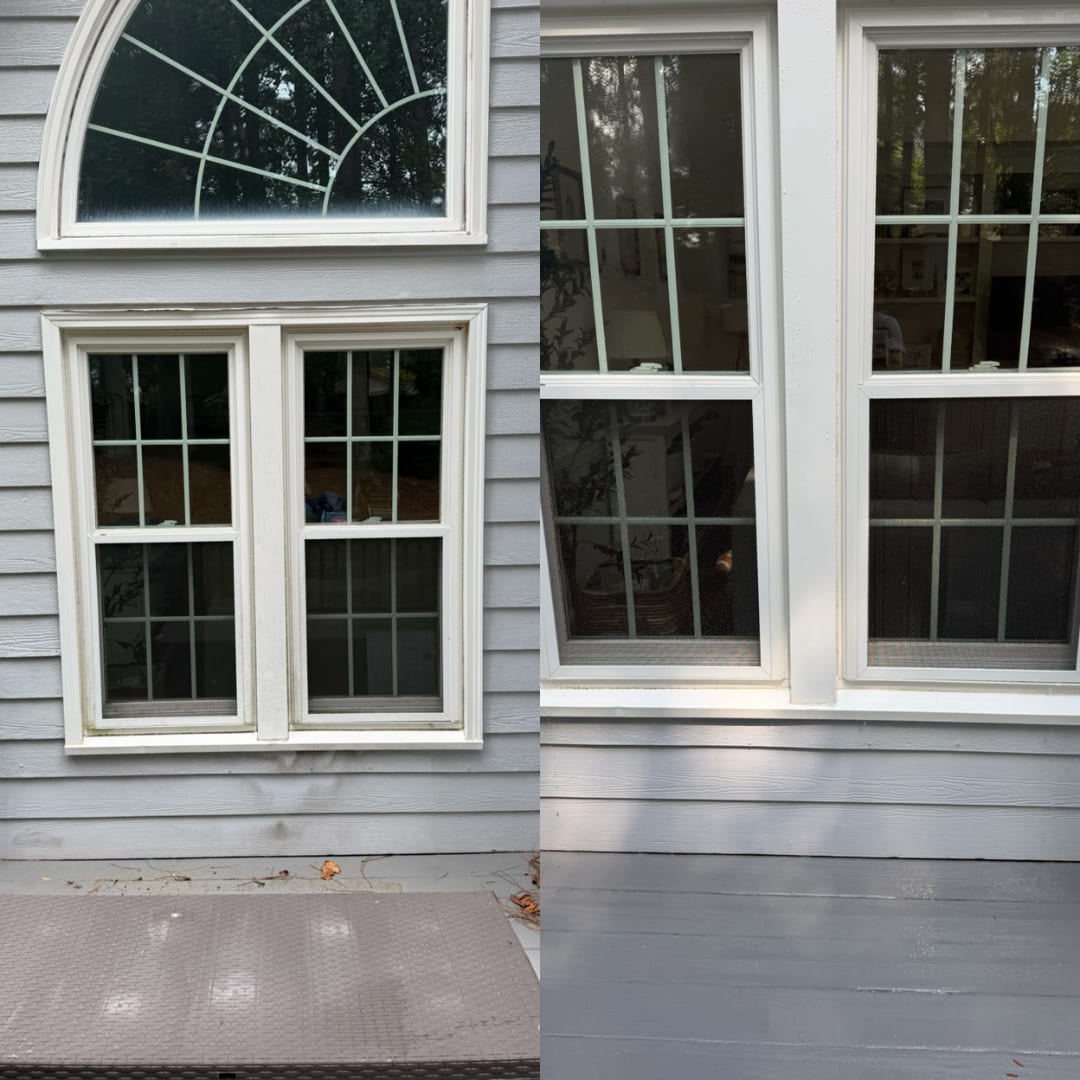 Before and after house washing grey siding, window trim and deck boards by KM Property Restorations in Marietta