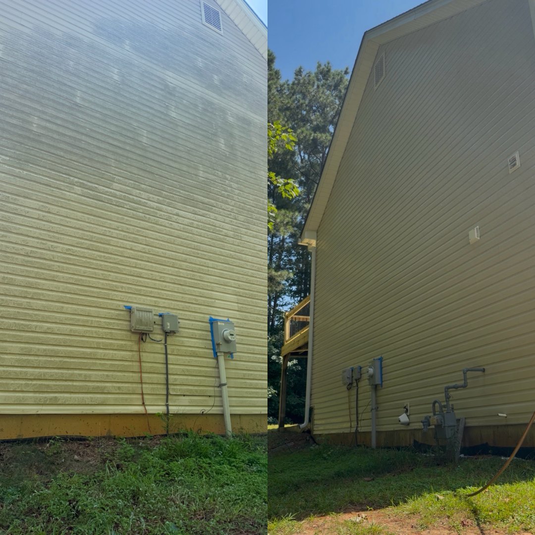 Before and after soft washing the side of a home by KM Property Restorations in Marietta