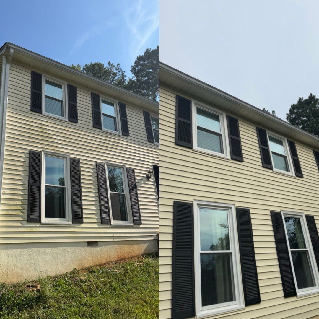 Before and after house washing a two-story front with black shutters by KM Property Restorations in Marietta